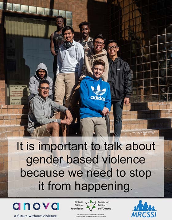 Group of young men outside building on stairs